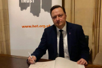 Jason McCartney MP signs the Holocaust Educational Trust memorial book